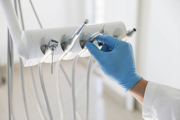 Professional Dental Veneers technician working in Central Square, NY